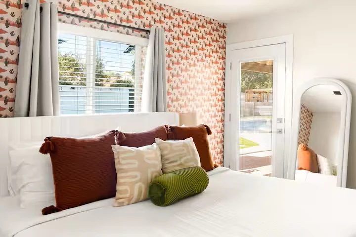 Bedroom with cactus wallpaper and patio access — The Sunkiss, Scottsdale, Arizona